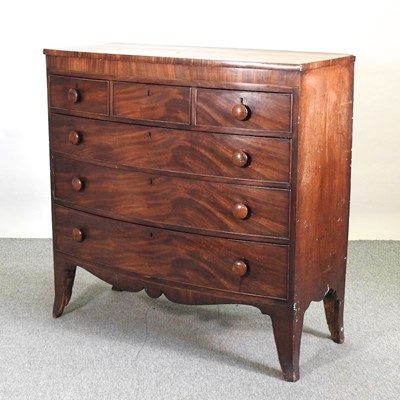 Lot 719 - A George III mahogany bow front chest of drawers