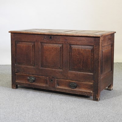 Lot 529 - An 18th century oak mule chest