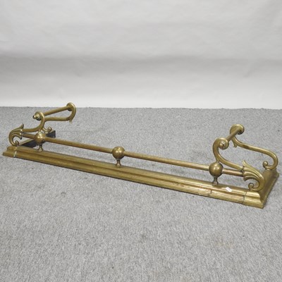 Lot 77 - An Art Nouveau brass fender