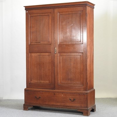 Lot 754 - An Edwardian oak cabinet