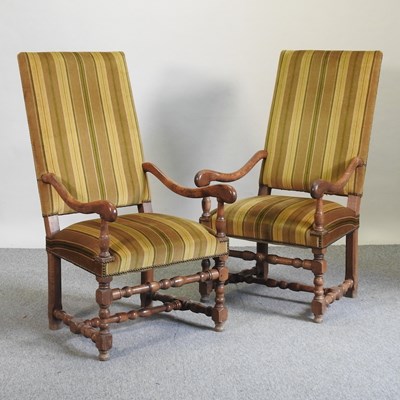 Lot 767 - A pair of oak and upholstered open armchairs