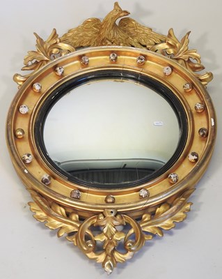 Lot 39 - A Regency carved pine and gilt gesso framed convex wall mirror