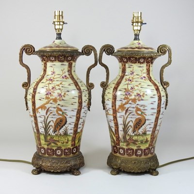 Lot 243 - A pair of pottery table lamps