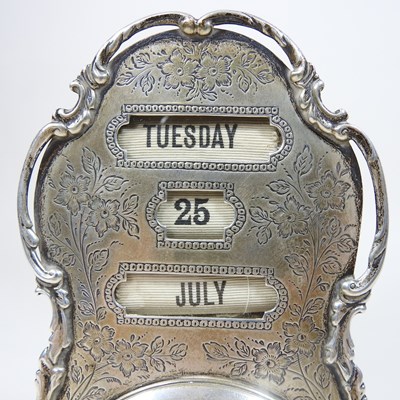 Lot 125 - An Edwardian silver desk clock/calendar