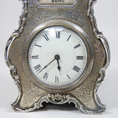 Lot 125 - An Edwardian silver desk clock/calendar