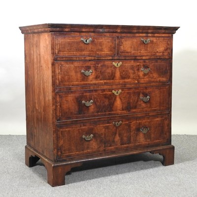 Lot 772 - An 18th century walnut chest