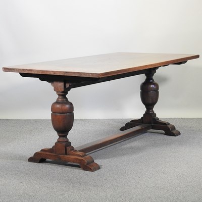 Lot 721 - An early 20th century oak refectory dining table