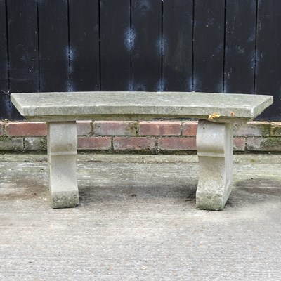 Lot 353 - A reconstituted stone garden bench