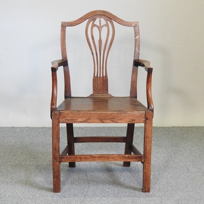 Lot 764 - A 19th century oak elbow chair