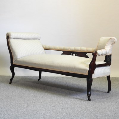 Lot 545 - A Victorian cream upholstered chaise longue