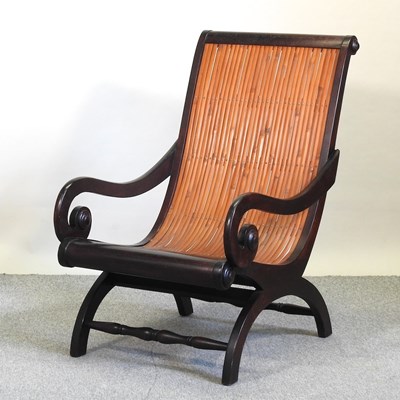 Lot 773 - A modern hardwood armchair