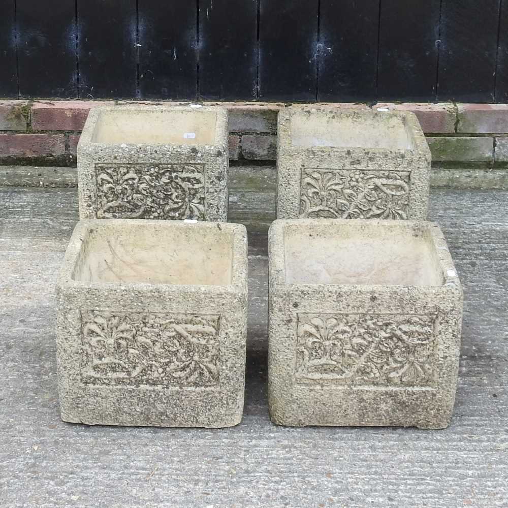 Lot 358 - A set of four Cotswold stone garden planters