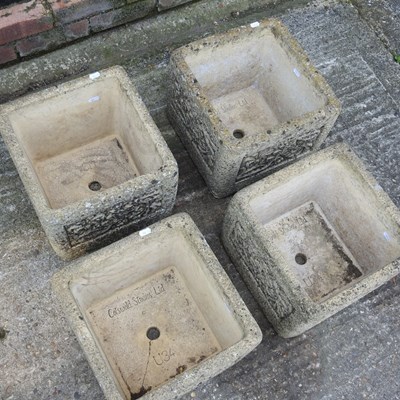 Lot 358 - A set of four Cotswold stone garden planters