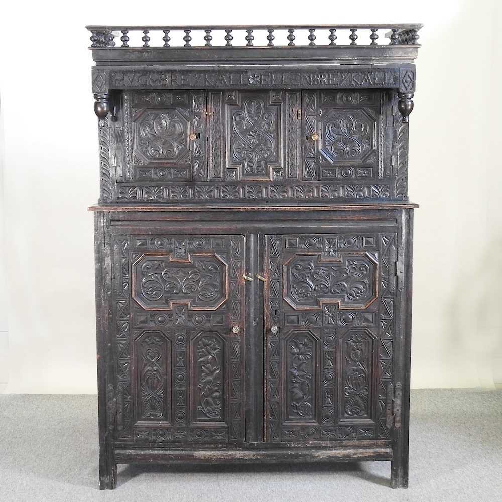 Lot 787 A 19th century carved dark oak court