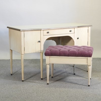 Lot 403 - A cream painted dressing table