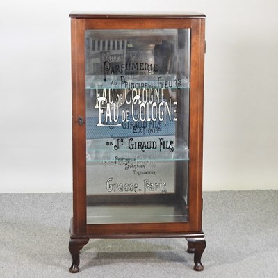 Lot 449 - A mid 20th century French perfume cabinet
