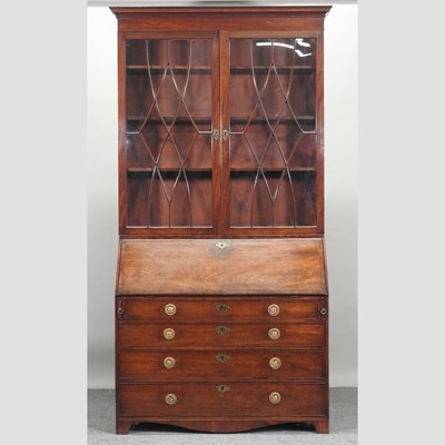 Lot 313 - A George III mahogany bureau bookcase, 113cm