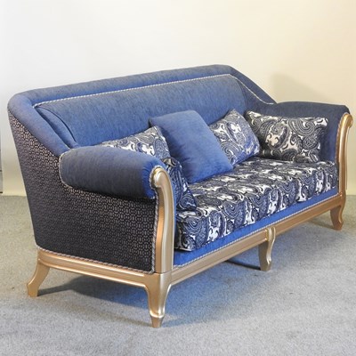 Lot 507 - A modern gilt framed and blue upholstered sofa