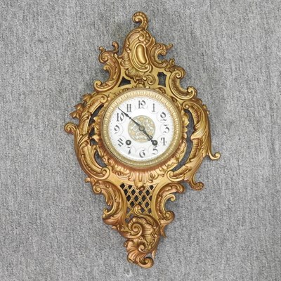 Lot 200 - A Rococo style gilt cartel clock