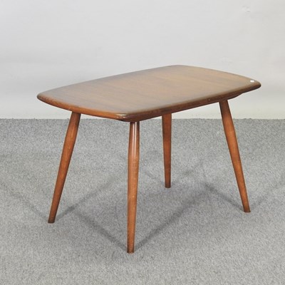 Lot 628 - An Ercol elm occasional table