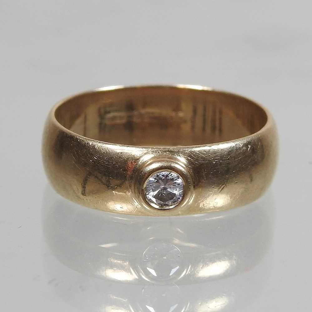 Lot 5 - A 9 carat gold and diamond set ring