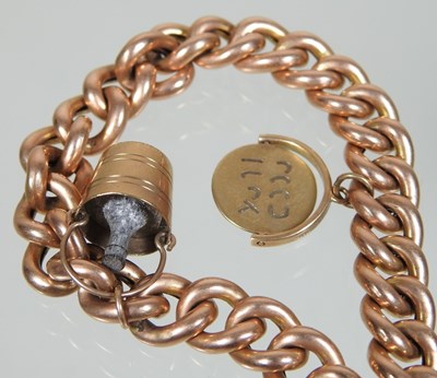 Lot 17 - A 15 carat gold curb link charm bracelet