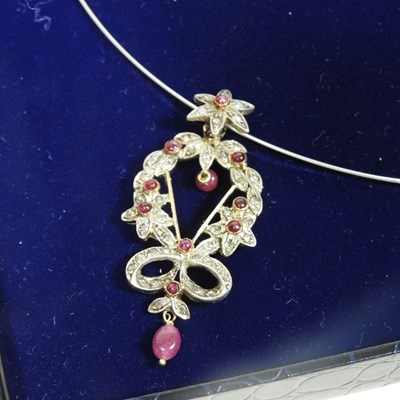 Lot 4 - An antique 18 carat gold diamond and ruby earring and necklace set