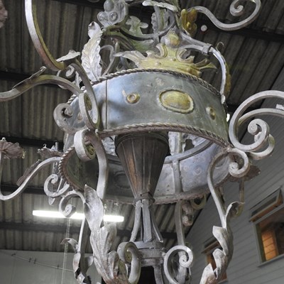 Lot 394 - A large wrought iron chandelier