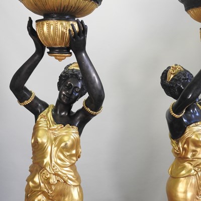 Lot 426 - After Milo, Miguel Fernando Lopez, Portuguese, contemporary, a pair of bronze and gilt figures
