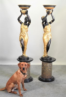 Lot 426 - After Milo, Miguel Fernando Lopez, Portuguese, contemporary, a pair of bronze and gilt figures