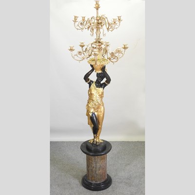 Lot 280 - After Milo, Miguel Fernando Lopez, Portuguese, contemporary, a bronze and gilt figure