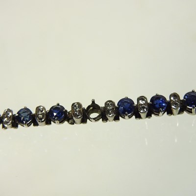 Lot 8 - An early 20th century unmarked white metal line bracelet