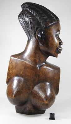 Lot 111 - A mid 20th century African carved portrait bust
