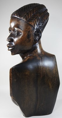 Lot 111 - A mid 20th century African carved portrait bust