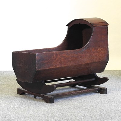 Lot 483 - An 18th century oak cradle