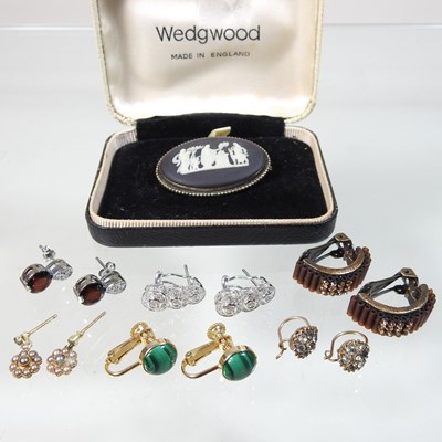 Lot 61 - A pair of 14 carat gold diamond pendant earrings
