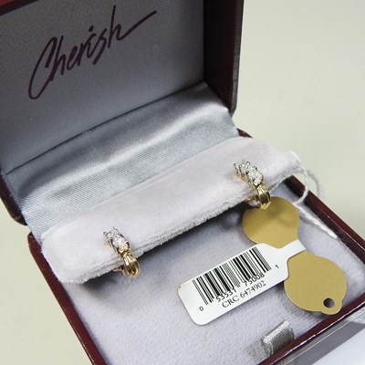 Lot 65 - A pair of 10 carat gold diamond earrings