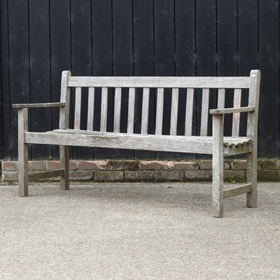 Lot 319 - A teak garden bench