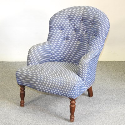 Lot 552 - A blue upholstered armchair