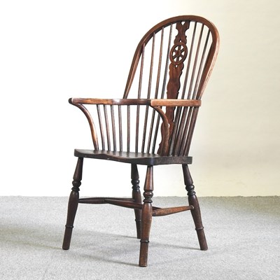 Lot 460 - A 19th century wheelback chair