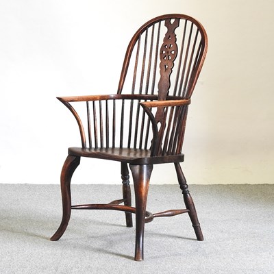 Lot 563 - A 19th century wheelback chair