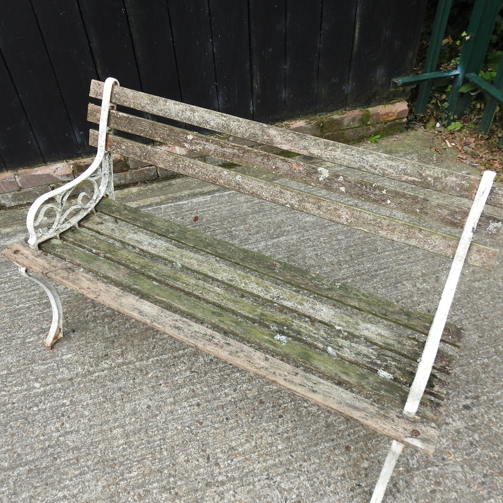 Lot 343 A cast iron garden bench