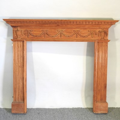 Lot 328 - A carved pine fire surround