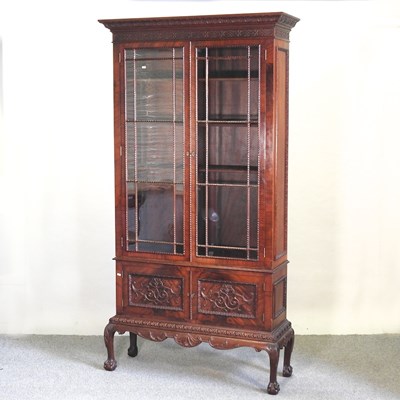 Lot 553 - An Edwardian cabinet on stand