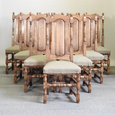 Lot 565 - A set of ten 18th century style oak dining chairs