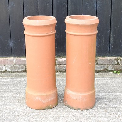 Lot 315 - A pair of terracotta chimney pots