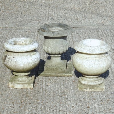 Lot 338 - Two weathered marble garden urns