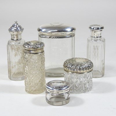 Lot 101 - A collection of silver and glass dressing table items
