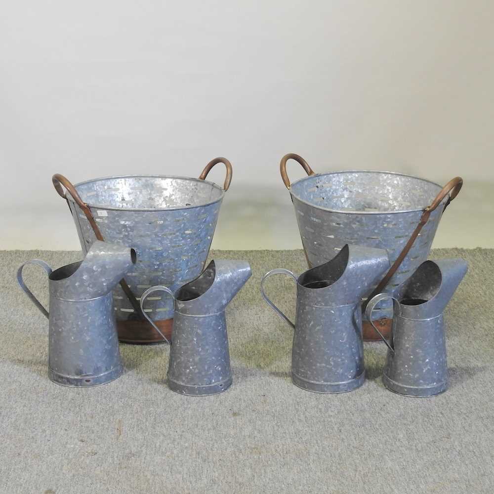 Lot 47 - Two galvanised jugs, together with two oyster buckets