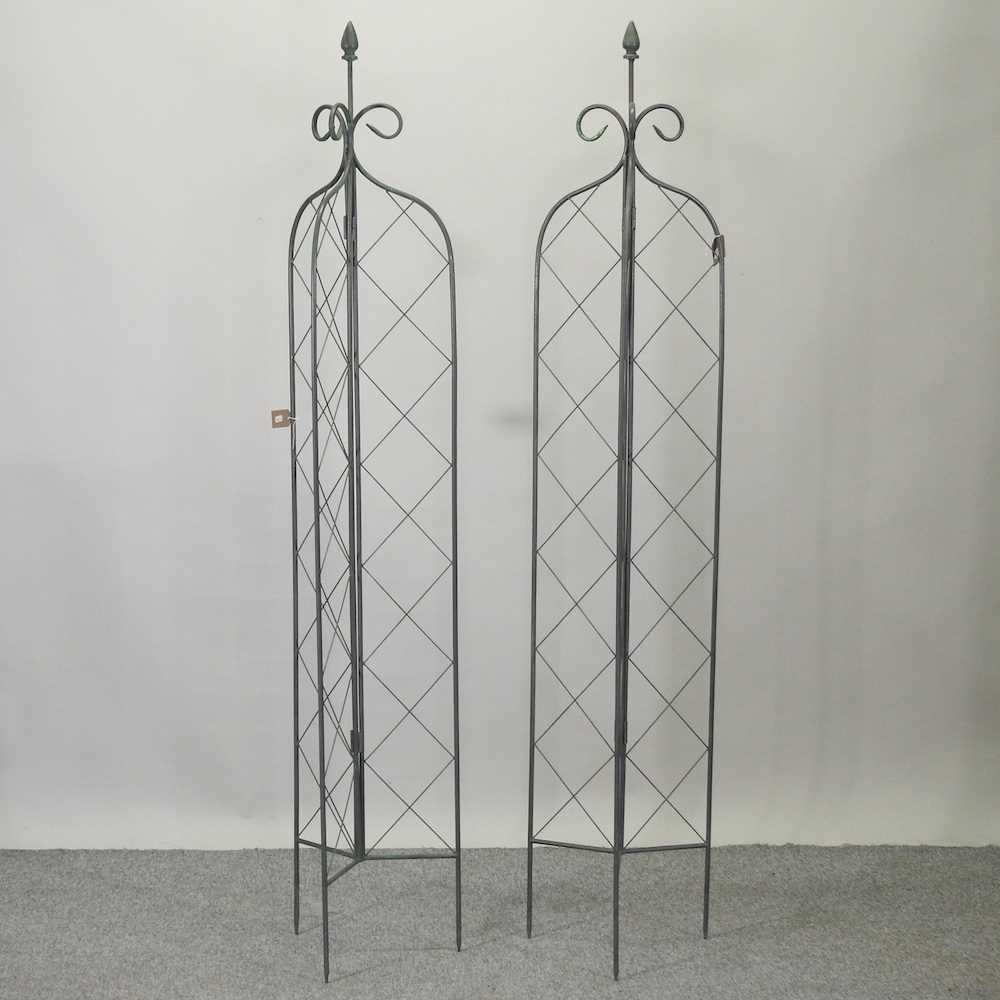 Lot 8 - A pair of metal lattice folding garden spires